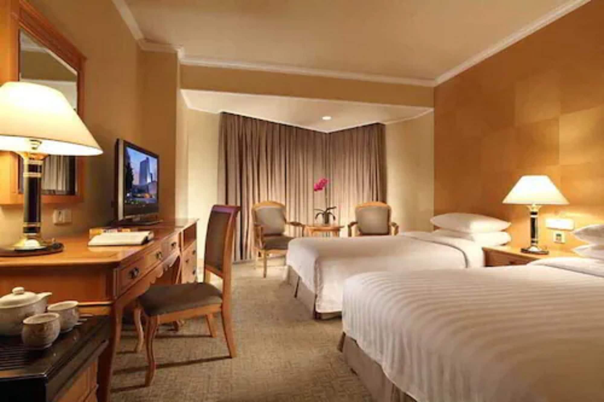 Beijing New Century Hotel Room photo