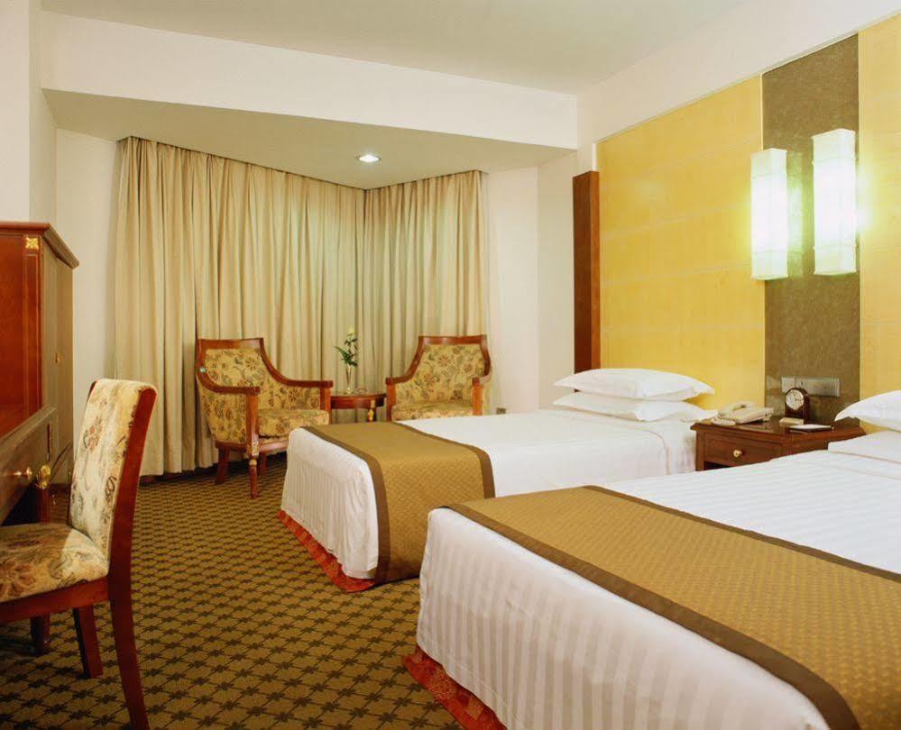 Beijing New Century Hotel Room photo