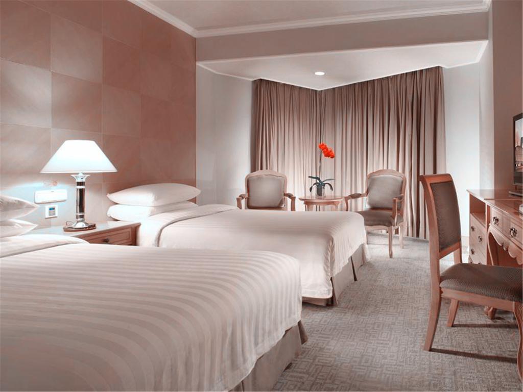 Beijing New Century Hotel Room photo